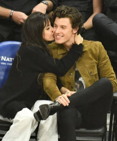 Sofia Cabello's sister, Camila Cabello, with her boyfriend, Shawn Mendes, in a romantic moment at an NBA game.
